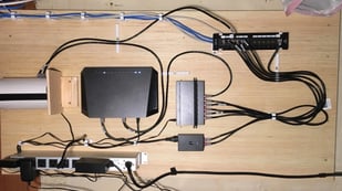 Featured image of 15 Functional Cable Management Solutions to 3D Print