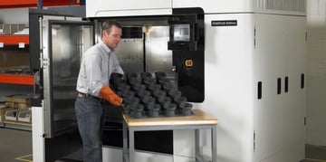 Industrial grade Stratasys 3D printer in use.