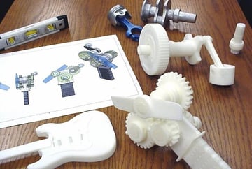 Several iterations of a 3D printing prototyping cycle.