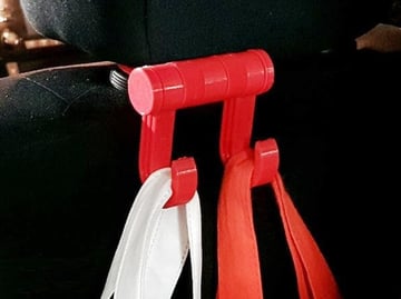 These hangers attach securely to the posts on your headrest