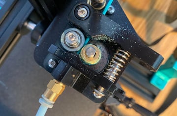Filament grinding is when your extruder strips your filament and starts slipping on it