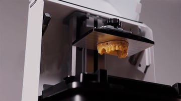 Obraz streszczenia wiadomości z branży druku 3D: Ackuretta wprowadza nową drukarkę dentystyczną Plug & Play
