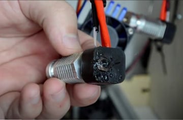 This nozzle has seen better days