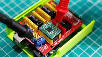 Ground the multimeter and place the red probe on the potentiometer