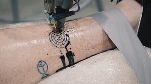 Featured image of World’s First Tattoo by an Industrial Robot Arm