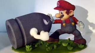 Featured image of 10 Cool 3D Printed Retro Gaming Statues & Figurines for Your Desktop