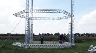 Featured image of Biggest 3D Delta Printer Ever: 12 Meters High, Prints Houses