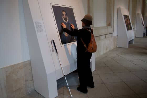MADRID, SPAIN - FEBRUARY 10: A blind person feels with her hands a copy of 'The gentleman with his hand on his chest' of El Greco at The Prado Museum on February 10, 2015 in Madrid, Spain. 'Hoy toca el Prado' (Touch The Prado) allows blind or vision-impaired visitors to explore with their hands the copies of six masterworks. The copies were created using a technique called 'Didu' which provides texture and volume to the paintings. (Photo by Pablo Blazquez Dominguez/Getty Images)