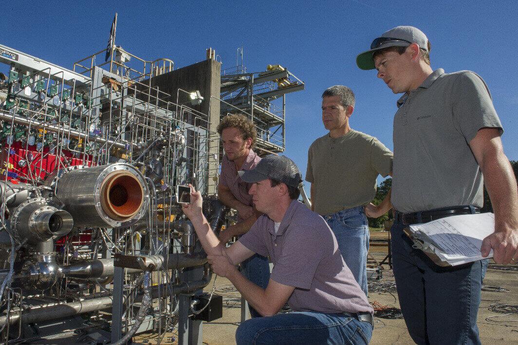 NASA 3D printed rocket: Engineers prepare a 3D printed breadboard engine made up of 75 percent of the parts needed to build a rocket engine for a test at NASA’s Marshall Space Flight Center in Huntsville, Alabama (image: NASA/MSFC/Emmett Given)