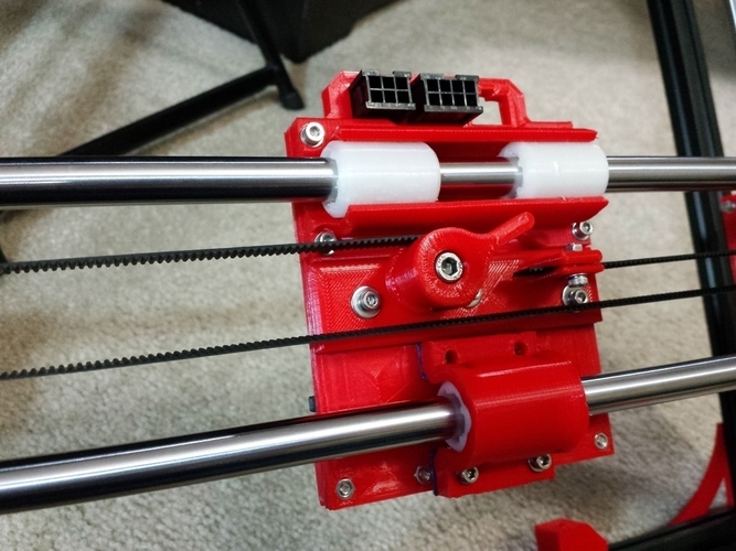 A belt and belt tensioner attached along a horizontal axis. The extruder can be mounted onto the assembly in order to be moved by the belt.