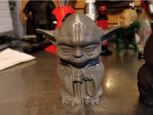 A mini Yoda trophy.