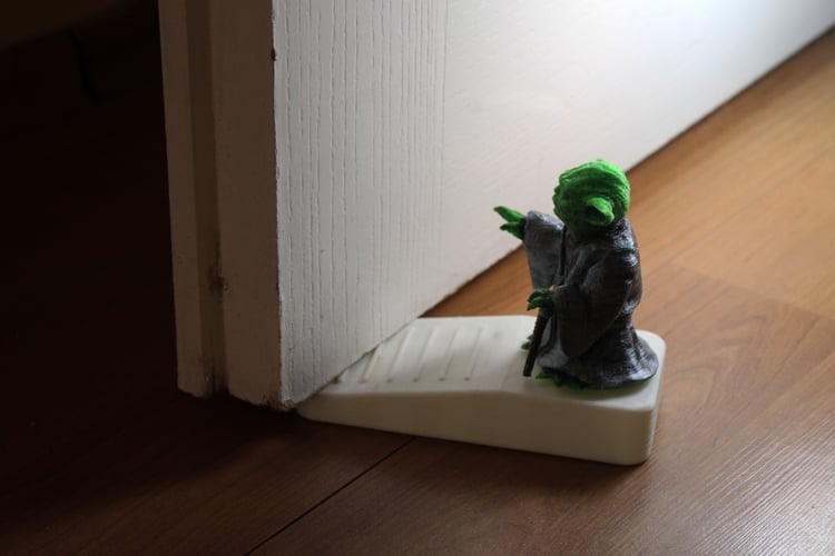 This Yoda will use the Force to keep your door at bay.