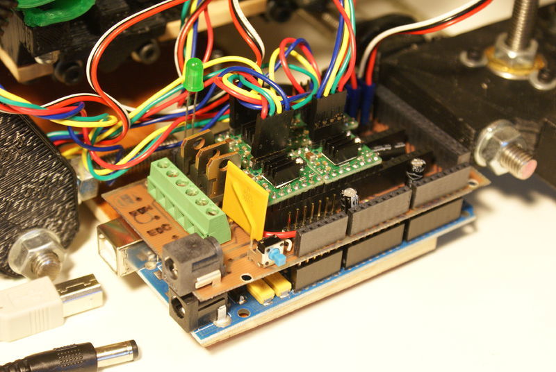 An early DIY RAMPS 1.2 board sits on top of an Arduino Mega.