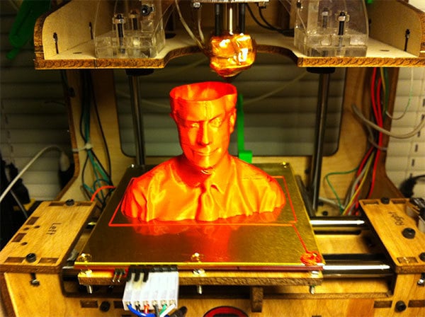 A 3D printer printing a human head.