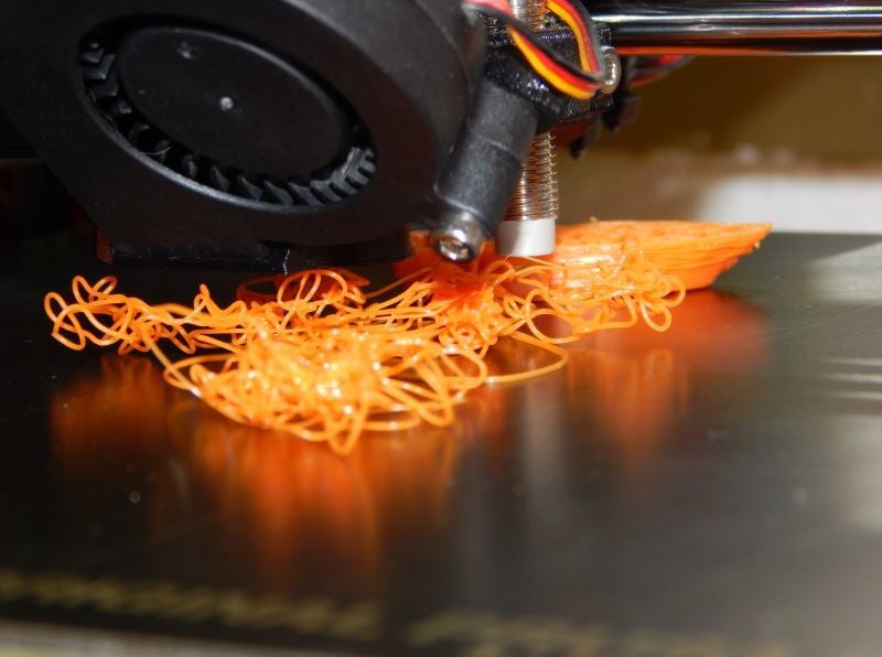 Printer Spaghetti - An unfortunate consequence of warping and improper adhesion.