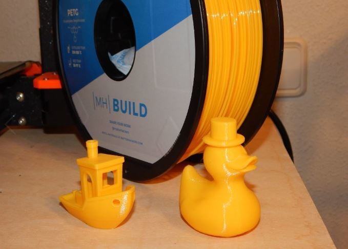 Two of our test prints, spool in rear.