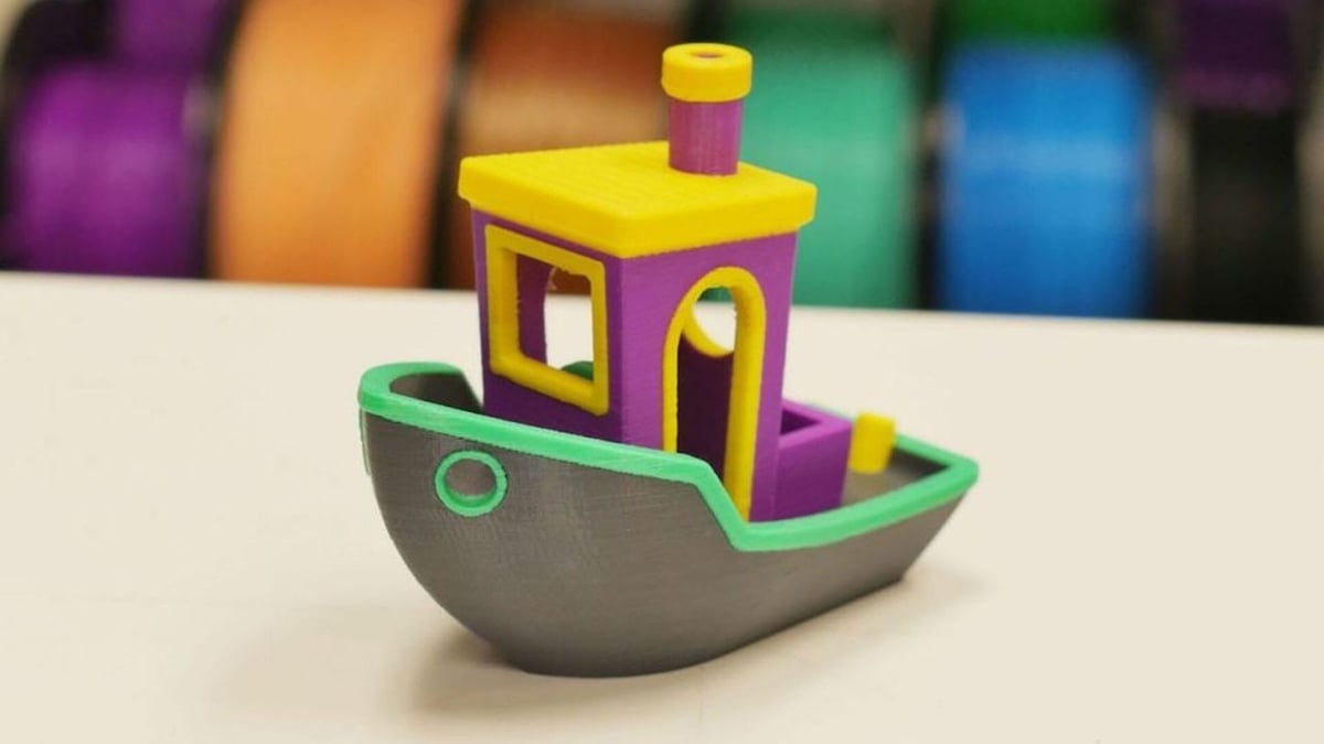 The popular 3D Benchy printed in multicolor.