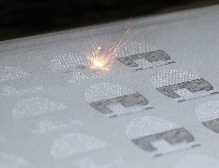 An SLS 3D printer beginning a print
