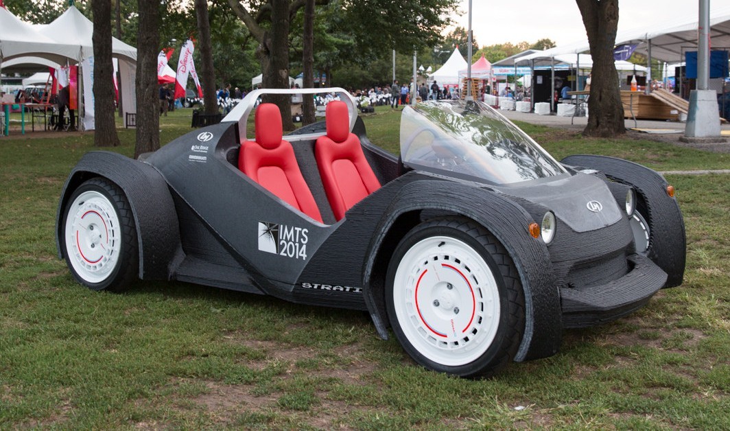 The Strati 3D printed car from Local Motors, with its hot red seats