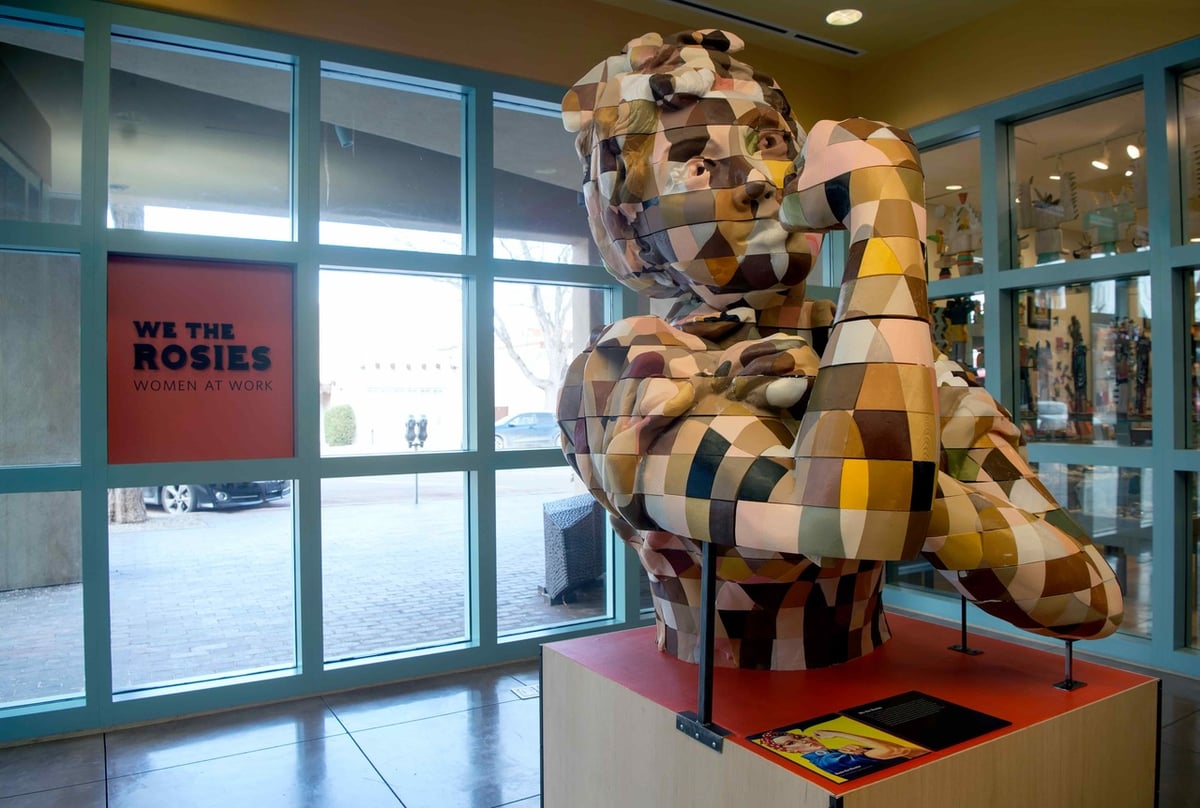 This gigantic Rosie the Riveter statue was made from various skin-tone colors of the many women she represents
