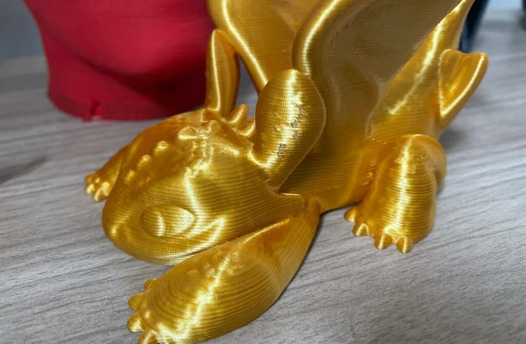 A golden dragon printed in Sunlu silk PLA
