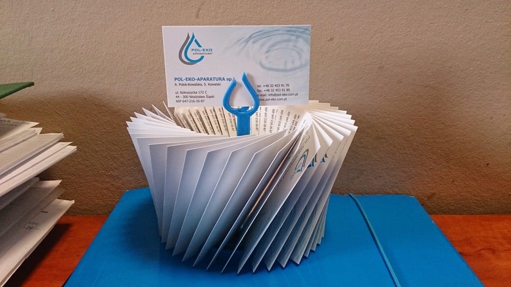 This circular business card holder is economical and useful