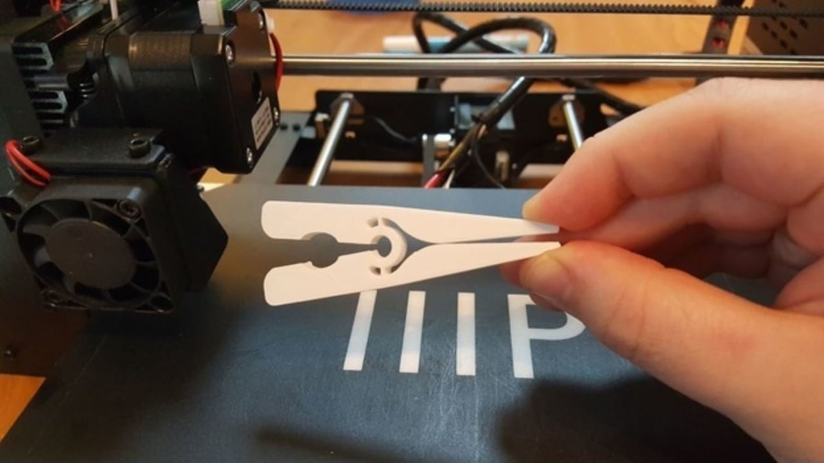 This clothespin is completely 3D printable and requires no springs