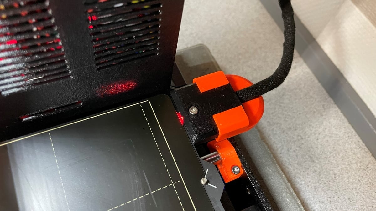 The cable support clips easily onto the printer