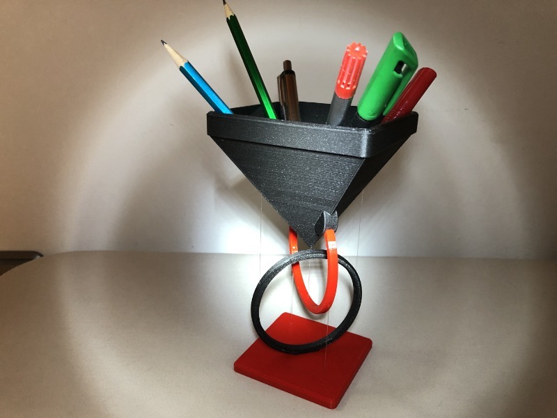 This floating pencil holder would look great on your tensegrity coffee table