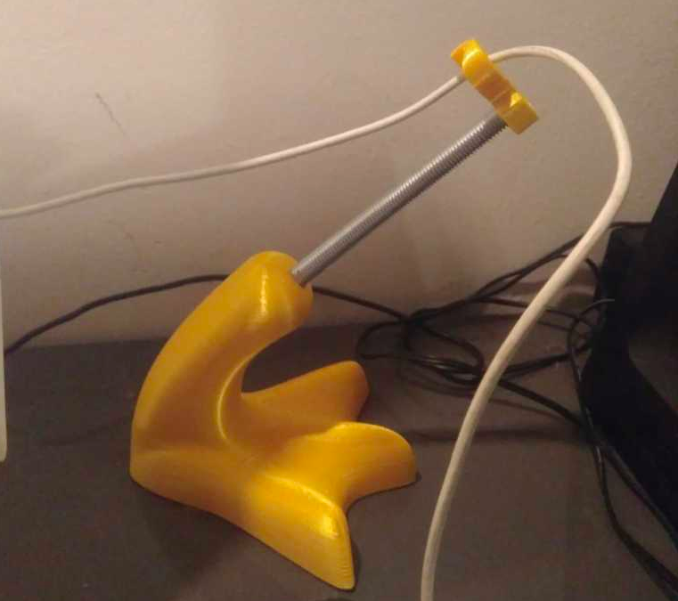 Spice up your desk with a bungee in the shape of a duck's foot