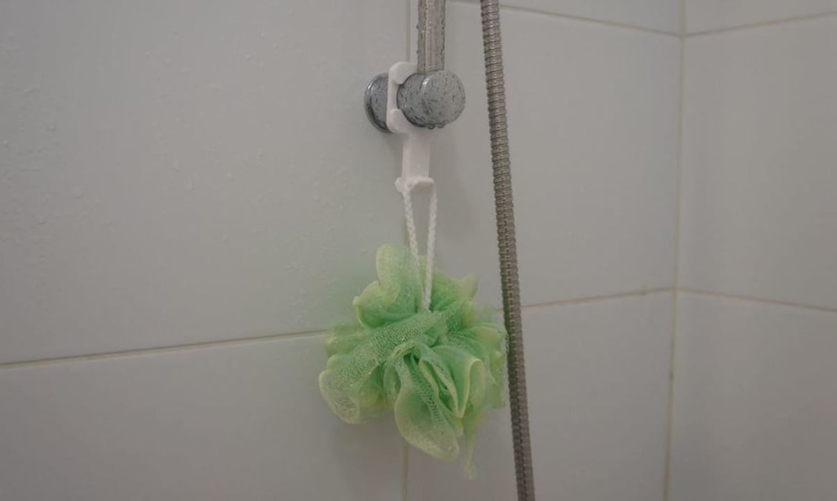 You can hold shower accessories on this hook like a soap saver