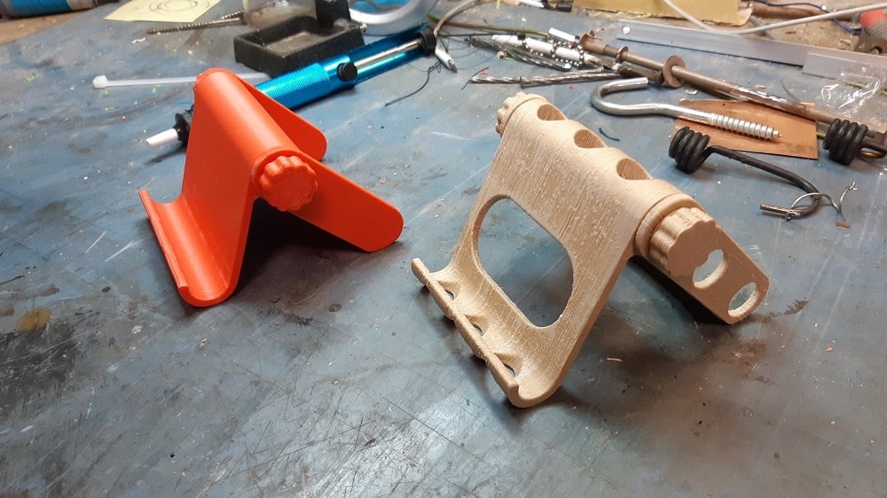 The original design (left) and a Remix in wood PLA