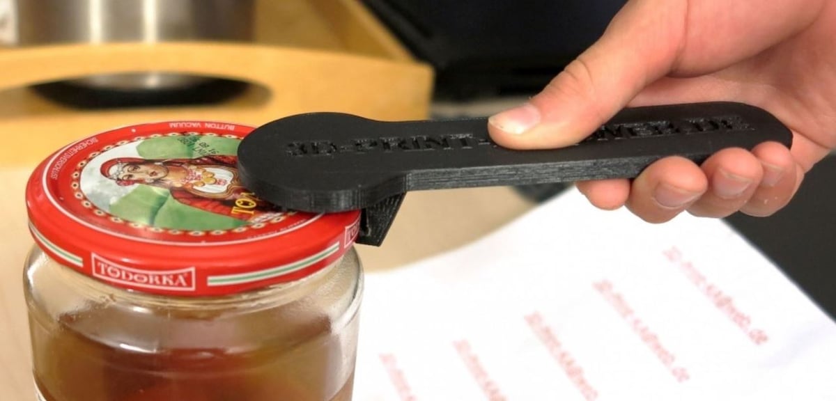 All you have to do is pry the lid off with this jar opener