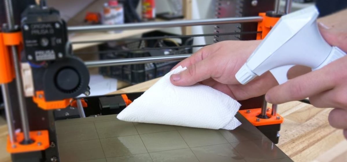 You can use a wipe or cloth to dry your print bed after cleaning it