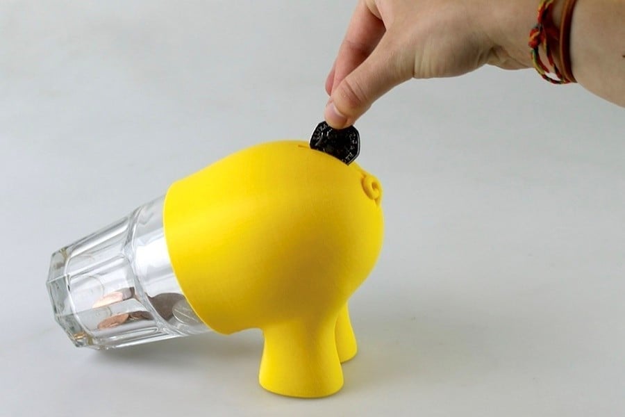 A brilliantly creative and amusing piggy bank hack based on a Pokal glass