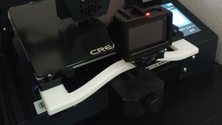You can attach a camera mount and camera to this bed handle to take time lapses of your prints or monitor your machine