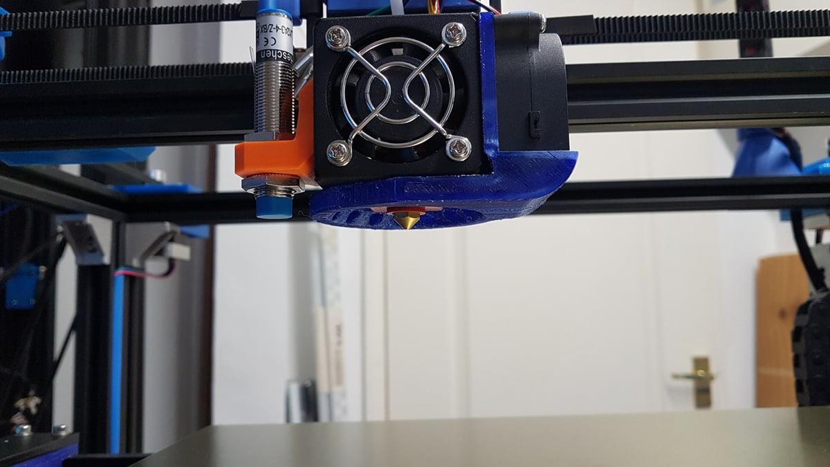 This fan duct provides more surround cooling to improve the way overhangs are printed