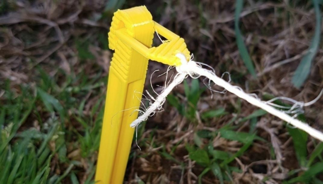 The stakes have a built-in piece that you can tie garden string around