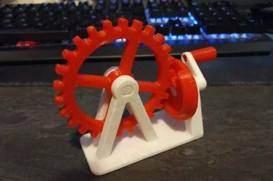 The gear in this mechanism moves when the spiral hoop structure rotates
