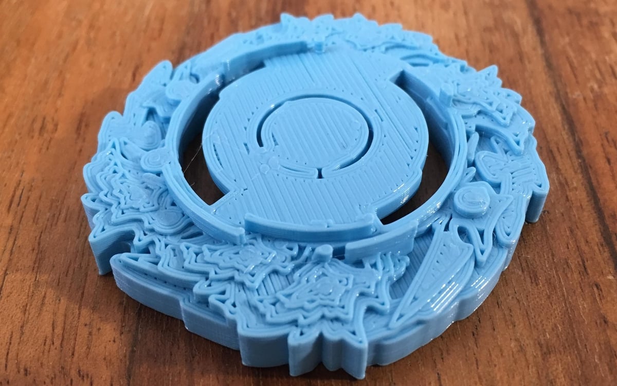 You can see the gaps made by a larger nozzle in this fan-made Beyblade