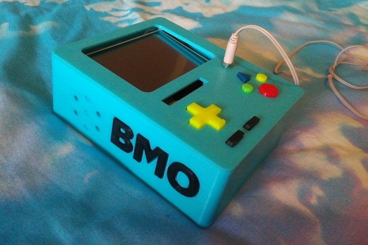 A handheld retro game console made in the form of BMO from Adventure Time, with a Raspberry Pi inside!