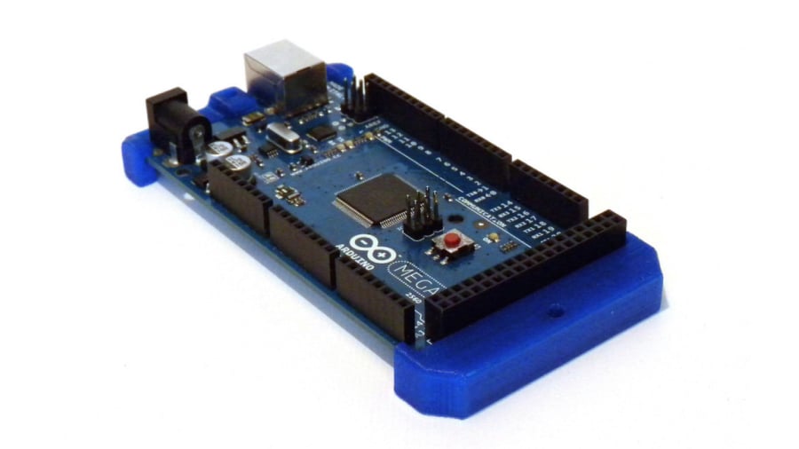 The two bumpers for the Arduino Mega are attached to the board to protect its bottom