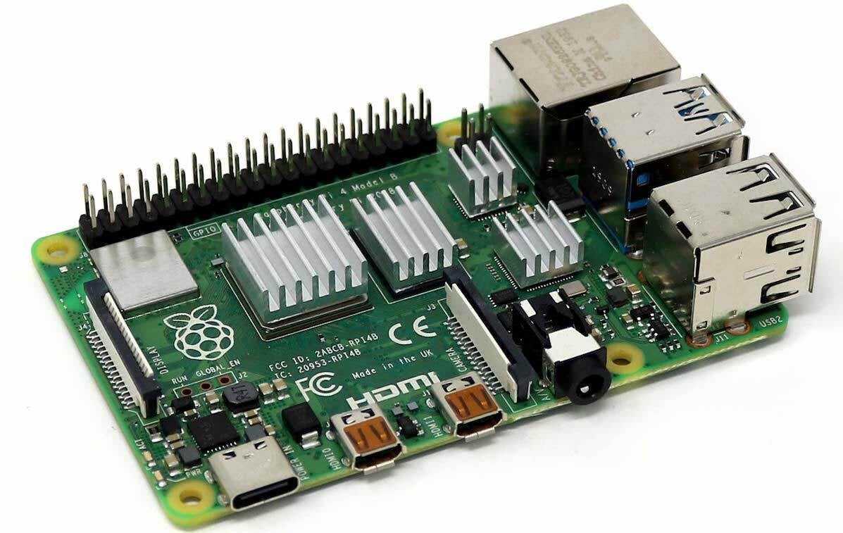 A Pi 4 showing the four main locations for heatsinks
