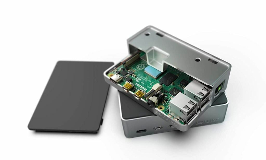 There are many metal cases that are designed with integral heatsinks for Raspberry Pi 4s