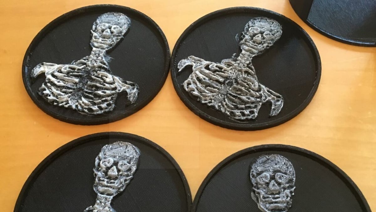 You can paint the skeleton figure on these coasters with white acrylic paint