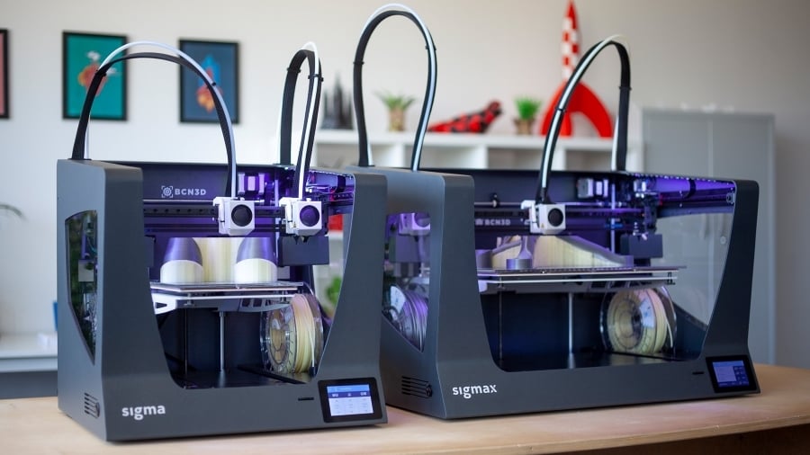 The Sigma (left) and Sigmax R19 (right), both open-source 3D printers by BCN3D