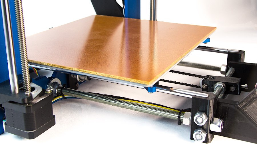 A solid print bed, along with rubber feet on your printer, can prevent vibrations