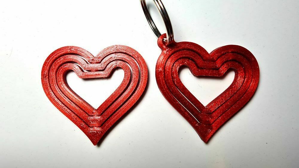 This gyro keychain uses hearts as the rings of the gyroscope