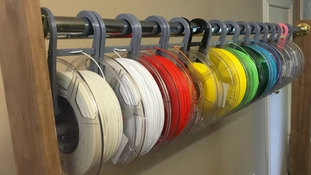 This hanging spool holder is made up of four 3D printable components