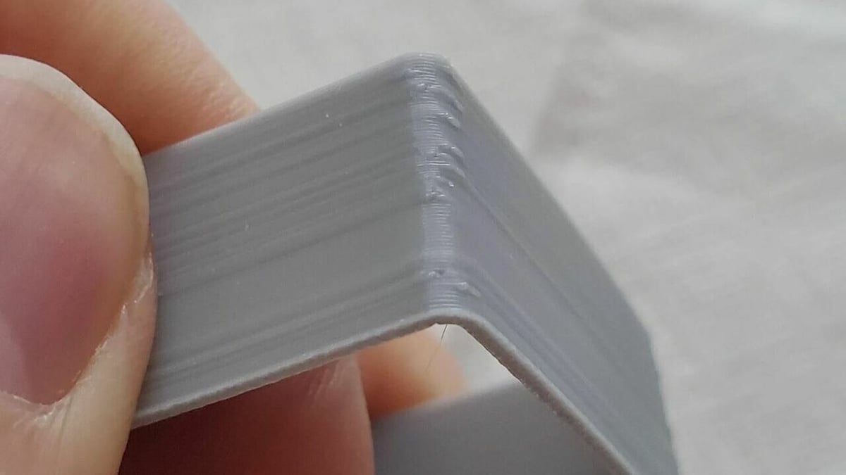 Using an Extra Prime Amount value that's too high will leave blobs on your print